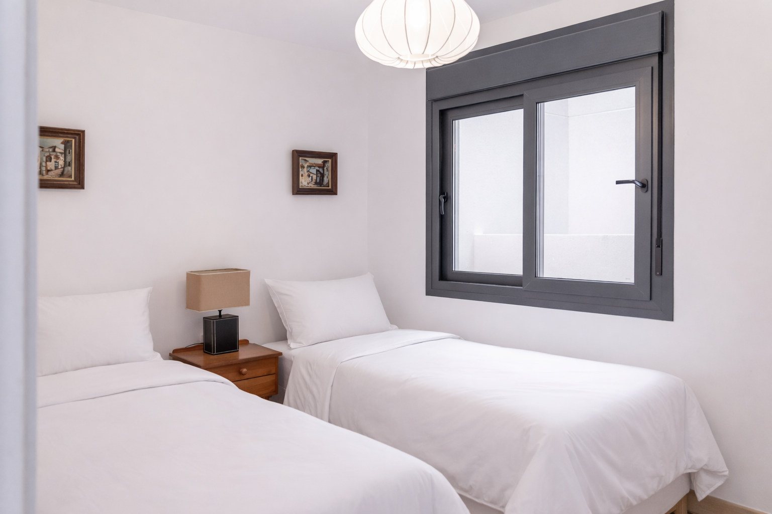 Second bedroom with two single beds